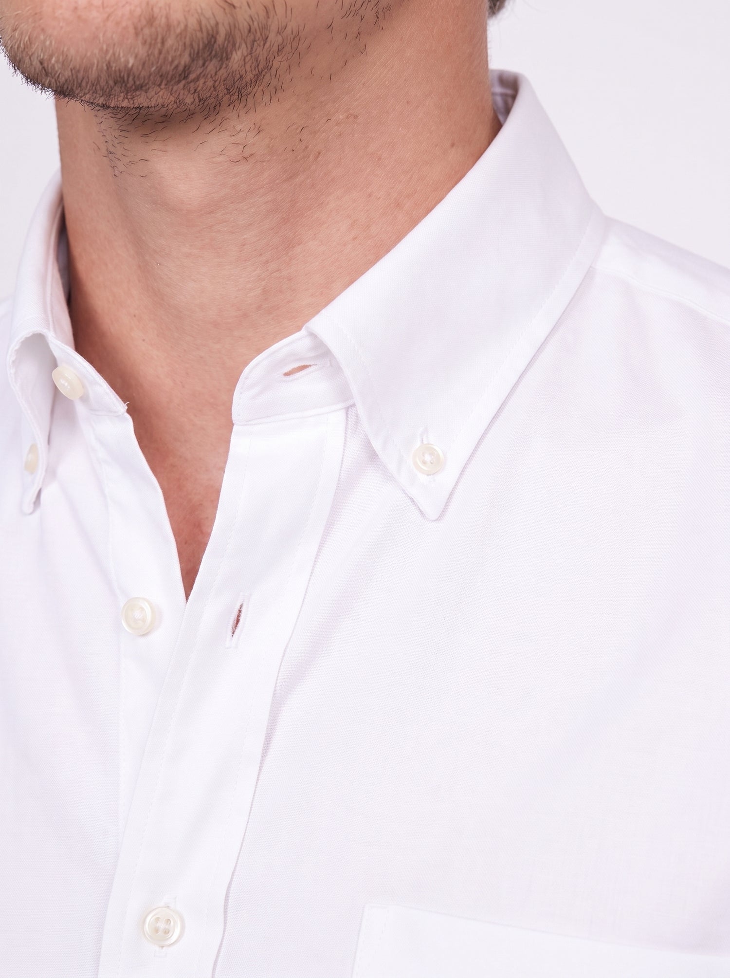 Plain white button-down shirt