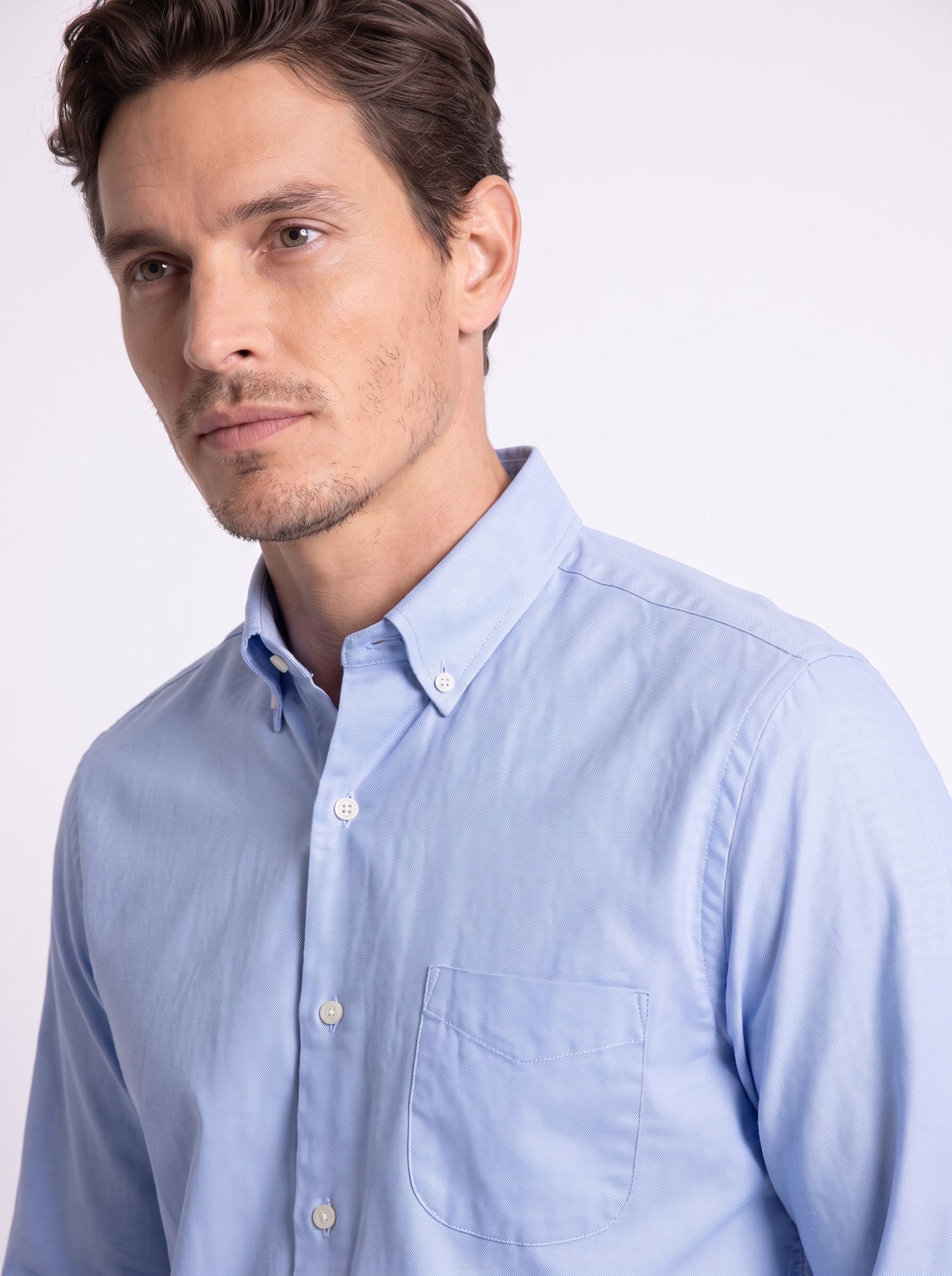 Plain light blue button-down shirt