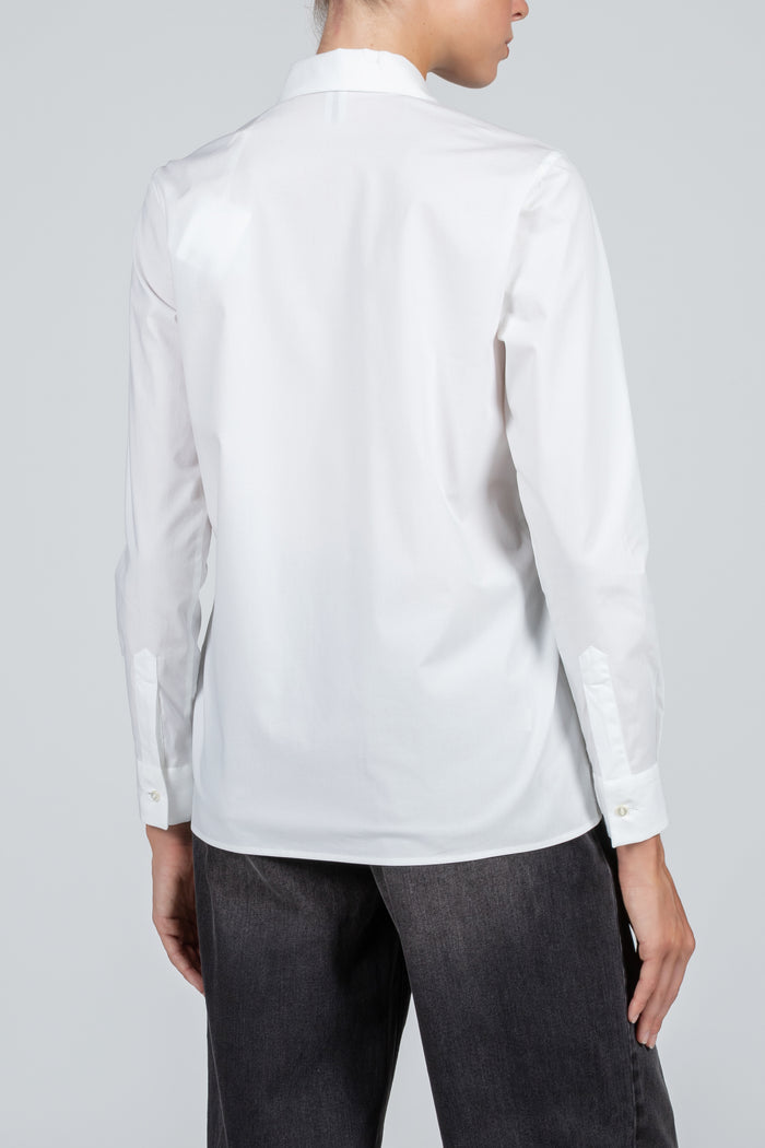 Camisa blanca elástica de mujer con volantes